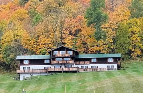 Upson Ski Chalet | Charming, ski-in, ski-out, lake-view chalet w/10 bedrooms, kitchen and AC.
