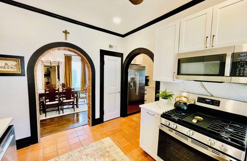 Sayles Blvd. Area House | Charming Spanish Revival Villa, Historic Sayles Neighborhood, Sleeps 8!