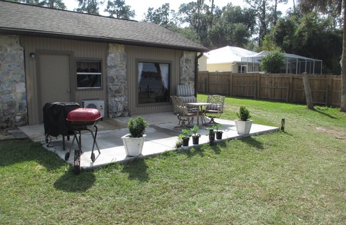 Hernando Cottage | Cheerful water front stone cottage. With beach. on bike trail.