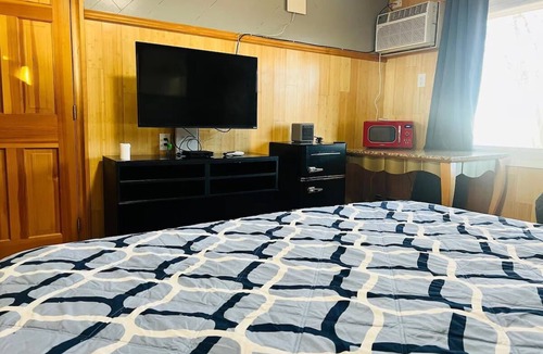 Random Lake Hotel | Comfy Room Stay Perfect for Budget Travelers Exploring Random Lake Area