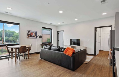 Lockerbie Square Apartment | CozySuites Mass with lounge and roof deck #9