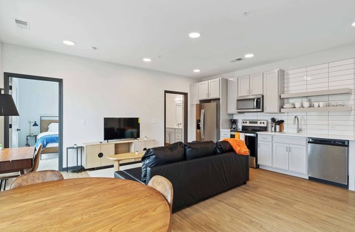 Lockerbie Square Apartment | CozySuites Mass with lounge and roof deck #9