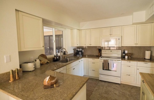 Park Center Place House | Design-Forward Gem, Heated Pool + Hot Tub, King Bed, Superhost, Flexible