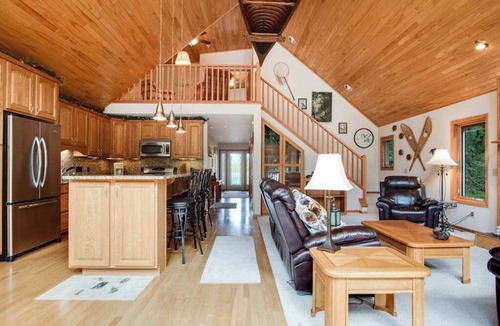 Eagle River House | Dog-friendly lakefront getaway with dock, firepit, wet bar, game room, & AC