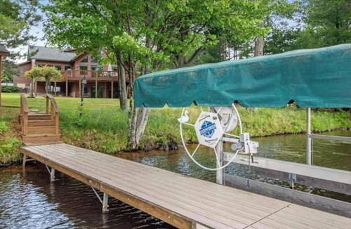 Eagle River House | Dog-Friendly Lakefront Escape: Dock, Firepit, Game
