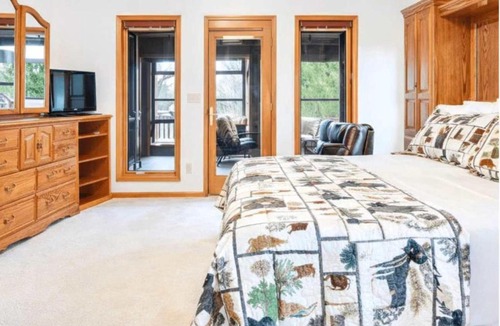 Eagle River House | Dog Friendly Lakefront Escape Dock Fire pit game room