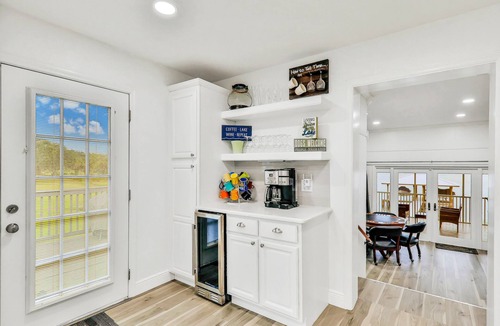 Sebring House | Dog-friendly lakefront home with fast WiFi, central AC, patio, & game room