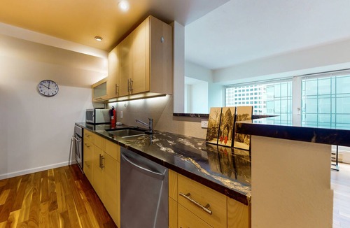 Downtown Seattle Condo | Downtown condo with city views, pool, & gym - 2 blocks from Pike Place