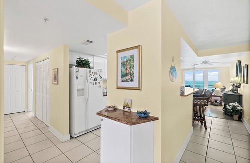 Ponce Inlet Condo | Enjoy this beachfront 2BR condo in Ponce Inlet with a ground-level patio offering direct access to pool and beach. Features a heated pool, fitness room, and clubhouse. Master has a king bed with private bath; guest room includes a king and two twins