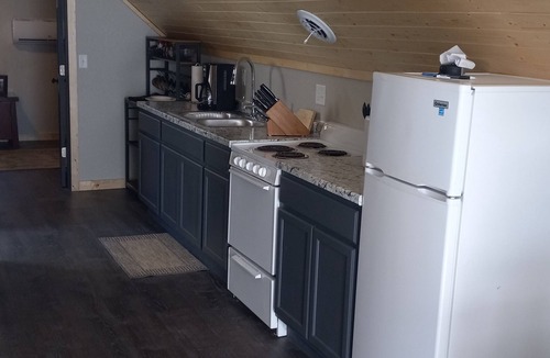 Nekoosa Cottage | "Experience Tranquility: The Loft on Camelot Lake - Your Serene VRBO Retreat"