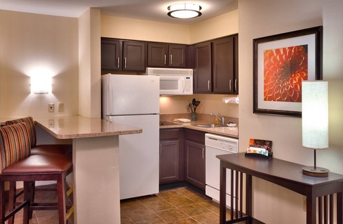 Peoria Condo | Free Breakfast. Pool & Hot Tub. Close to St. Francis Medical Center!