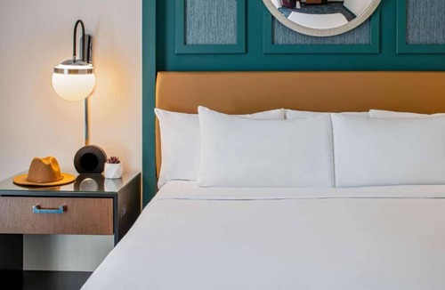 Central Business District Hotel | French Quarter Escape | Pet-friendly. Pool. Dining