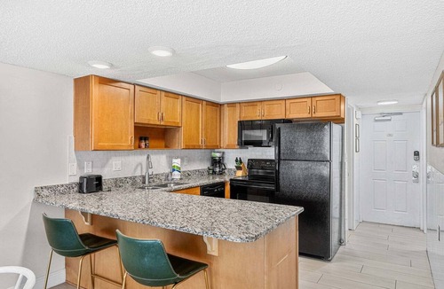 Satellite Beach Condo | Gorgeous Oceanside Oasis w/Heated Pool, Oceanfront Patio & Steps to the Beach 🏖️☀️