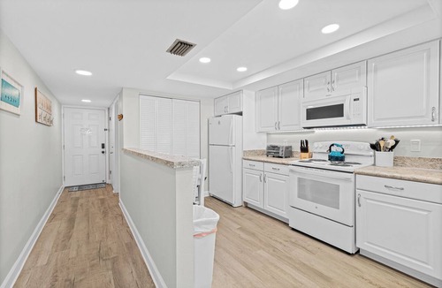 Indian Harbour Beach Condo | Ground Floor Oceanfront Condo Steps to Beach Unit 106 Sleeps 6