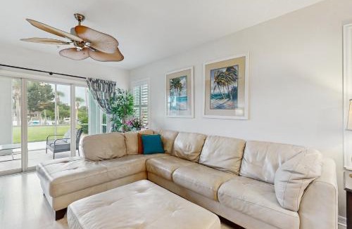 Palm Coast House | Ground floor waterview condo with resort amenities, private patio and pool