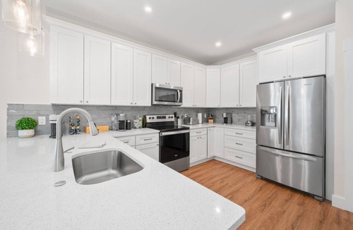 Butler Beach House | Heated Pool Oasis Arcade + Games Walk to Beach