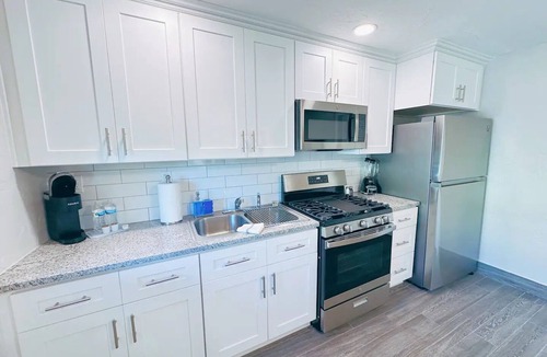 Boardwalk House | Hidden Beach Bungalow - Walking distance to the beach, shops and great eats!