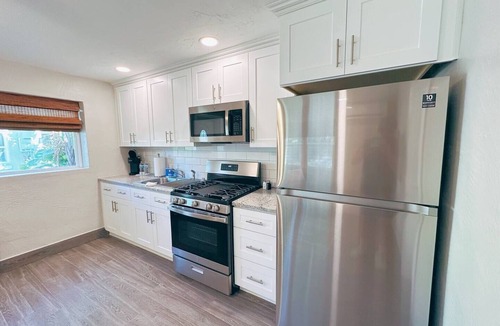 Boardwalk House | Hidden Beach Bungalow - Walking distance to the beach, shops and great eats!
