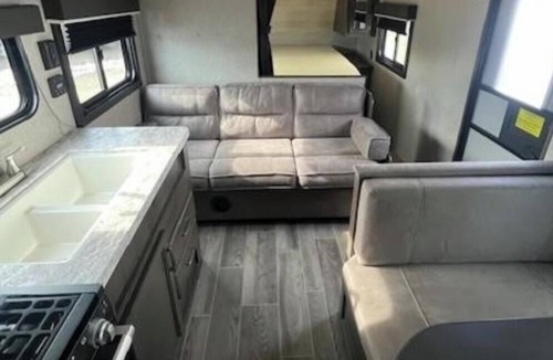 Oshkosh RV Rental | Hidden Haven Camper Beach, Pond, Firepit