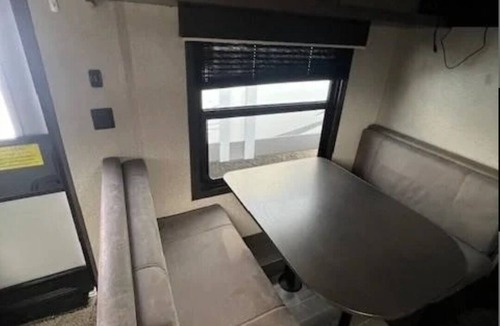 Oshkosh RV Rental | Hidden Haven Camper Beach, Pond, Firepit