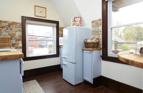 Highland Park House | Historic "Chauffeurs Quarters" Tiny House by Midtown, on Studebaker Estate