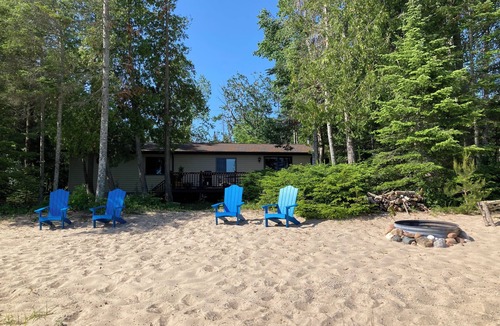 Cheboygan House | Home on Lake Huron with sandy beach and beautiful yards in Cheboygan, Michigan