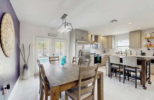Coral Heights House | Inviting villa with heated saltwater pool & tropical backyard oasis