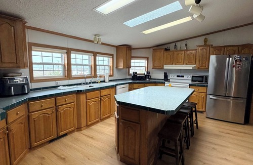Smithwick House | Just listed & remodeled. Amazing lake views, 3BR home seconds from Angostura!