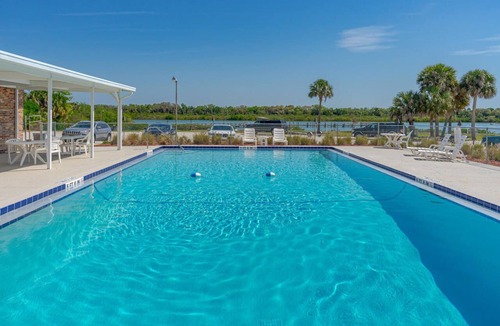 Edgewater House | Kick Back & Relax with two pools, a boat launch, community pier and more!
