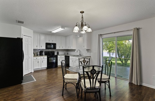 Fruit Cove House | King bed, Water Views, sleeps 8, TVs in every room, public pool.