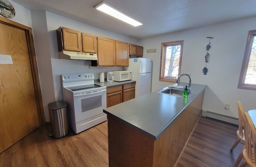 Upson House | LAKEFRONT 5-bedroom Chateau Getaway at Whitecap Mountains Resort Units 1 & 3