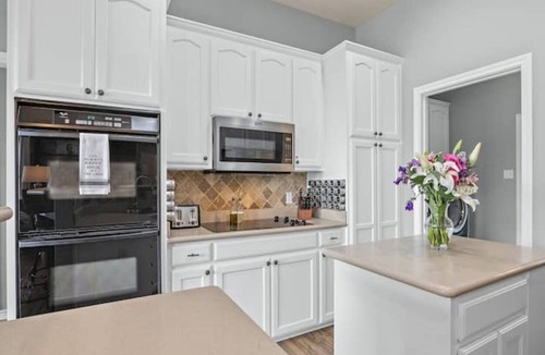 Runaway Bay House | Lakefront Escape with Private Dock, Kayaks & Stunning Sunset Views - Sleeps 12