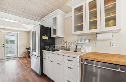 Gladwin House | Lakefront Gladwin Vacation Rental w/Deck & Dock!