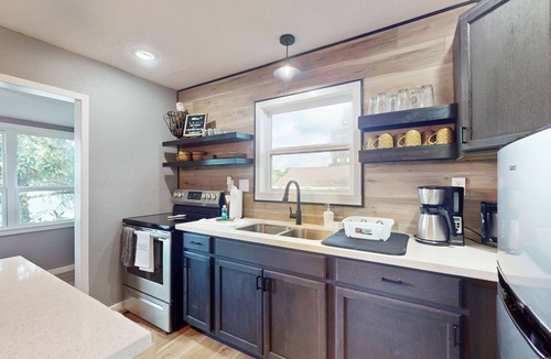 Lake Houston House | Lakefront home with Deck, Pedal-boat & Arcade