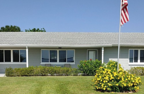 Sebring House | Lakefront private home with beach, dock and party area and large back yard