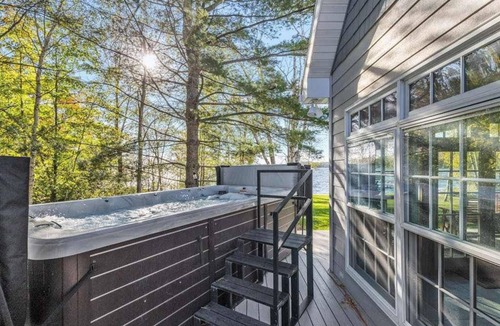 Phelps House | Lakefront retreat with hot tub, water view, game room, home theater & dock