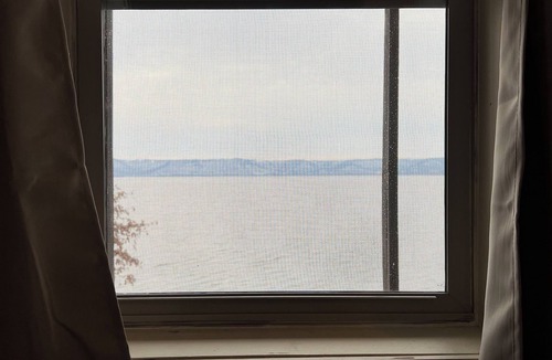 Brice Prairie Apartment | Lakefront studio. Natural setting, sunsets, kayaks, fishing dock, paved walking