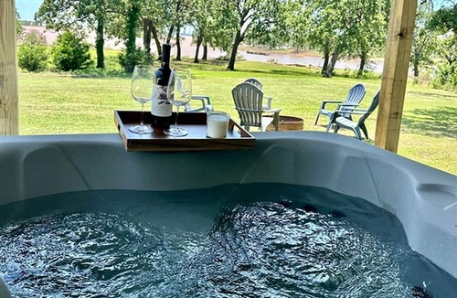 Madill Cabin | Lakeside Nature Retreat: Private Cabin, Outdoor Jacuzzi, Stunning Views in Madill, Oklahoma