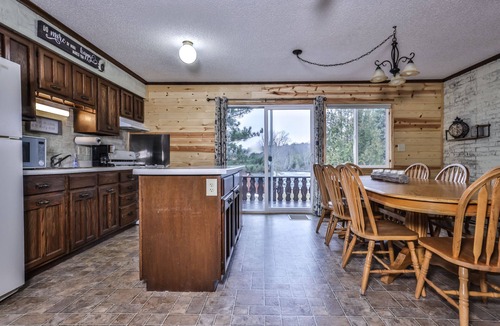 Watersmeet House | Lakeside wilderness resort cabin with dock, fire pit, on-site store, bait shop!