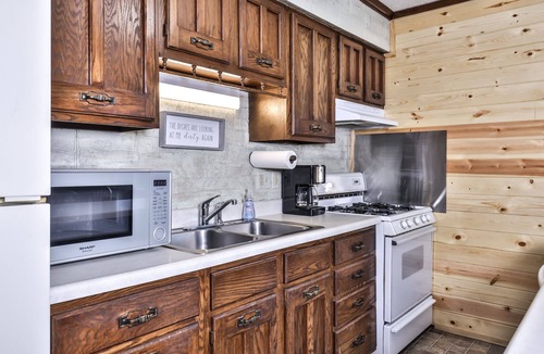 Watersmeet House | Lakeside wilderness resort cabin with dock, fire pit, on-site store, bait shop!