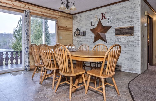 Watersmeet House | Lakeside wilderness resort cabin with dock, fire pit, on-site store, bait shop!