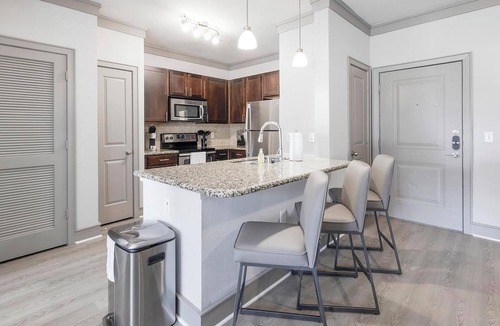 Northeast Carrollton Apartment | Landing | Chic 3BD, Clubhouse