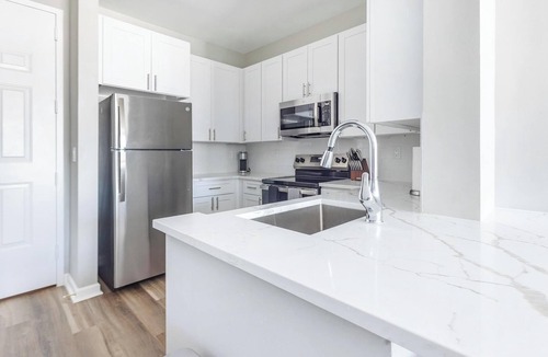 Raritan Apartment | Landing | Modern 2BD, Courtyard, Game Room