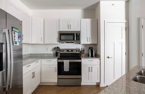 Downtown Indianapolis Apartment | Landing | Modern 2BD, Gym