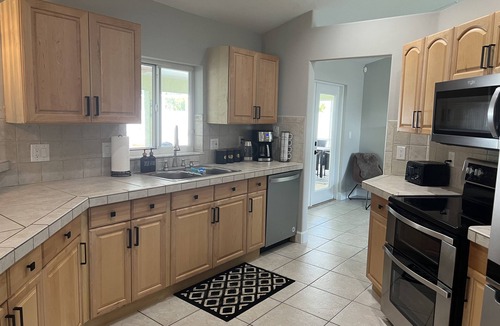 Palm Coast House | Large Charming House with Heated Pool and Outdoor Living
