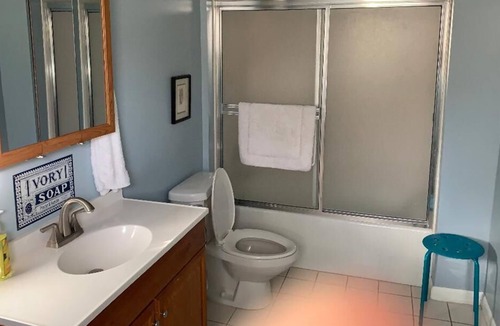 Calico Rock House | Lockie Lodge, rustic A frame style home with open concept.