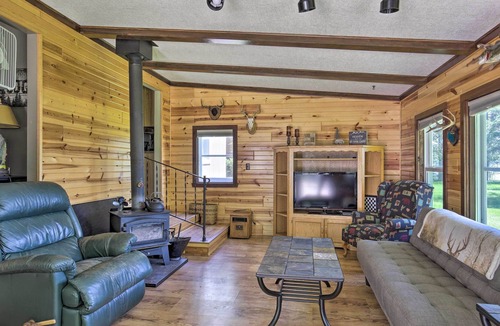Eagle River Cottage | Lovely Lakefront Cottage w/ Fire Pit & Yard!
