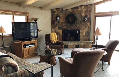 Eagle River House | Lovely Open-Concept Home on Catfish Lake w/Guest Cottage