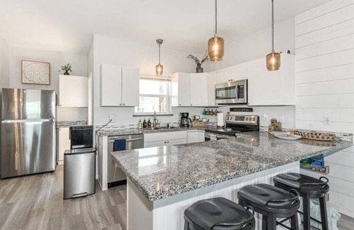 Surfside Beach Condo | Luxury Beachfront Condo with Covered Deck Steps From Beach & Golf Cart Rental