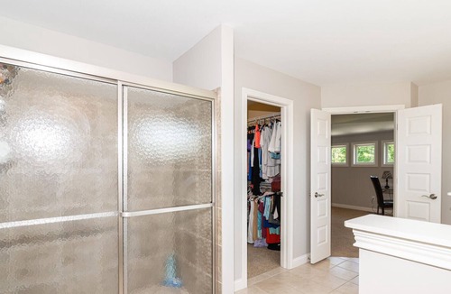 Maxwell House | Master bedroom with lake view Fishers